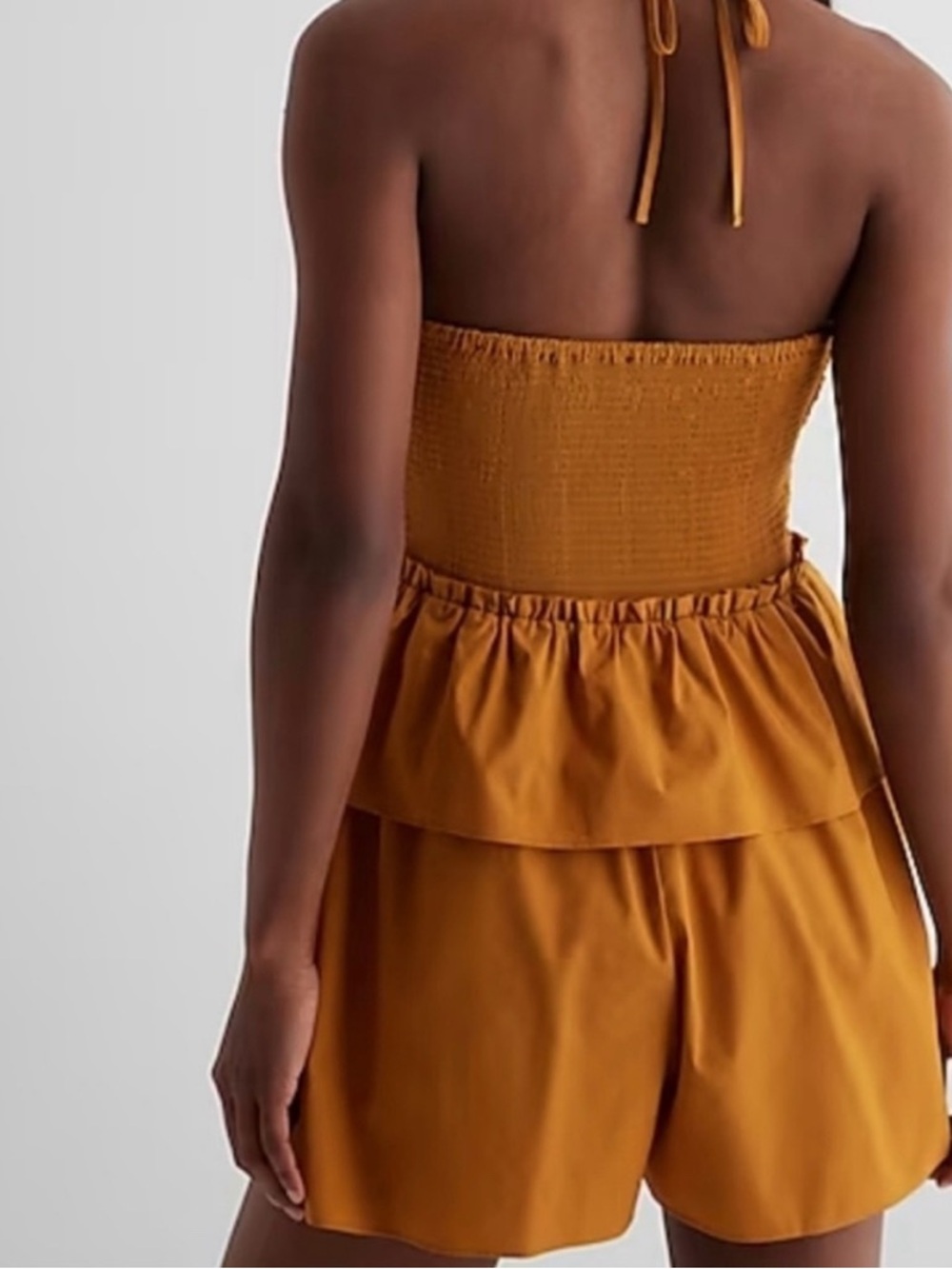 Express Mustard Strapless Ruched Peplum Mini Dress - Picture 2 of 6